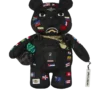 RUCSACUL MONEYBEAR CU STEAGURI INTERNAȚIONALE JAMES FIRST CLASS