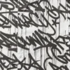 TRICOU CU MÂNECI SCURTE ȘI NASTURI ÎN FAȚĂ GRAFFITI